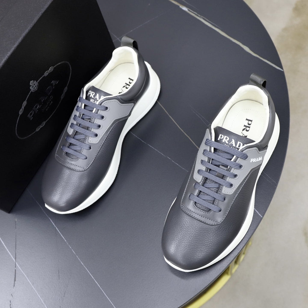 Prada Textured Low-Top Sneakers